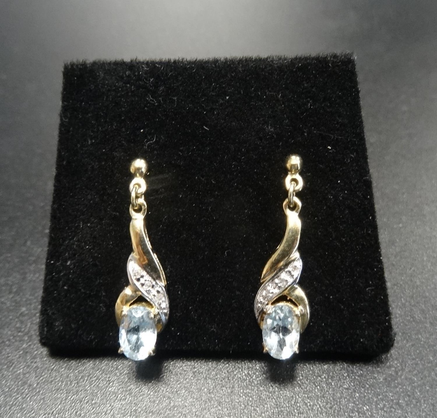 PAIR OF AQUAMARINE AND DIAMOND DROP EARRINGS in unmarked gold