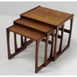G PLAN QUADRILLE NEST OF TABLES comprising three teak tables on distinctive sleigh supports, 53cm