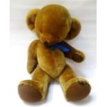 MERRYTHOUGHT PLUSH TEDDY BEAR with jointed limbs, plastic set eyes and a bell to each ear, 66cm high