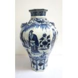 MID 20th CENTURY CHINESE BALUSTER VASE of hexagonal form decorated in blue and white with figures in