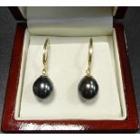 PAIR OF BLACK PEARL DROP EARRINGS on eighteen carat gold