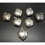 SEVEN SILVER HEART SHAPED LOCKET PENDANTS