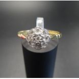 DIAMOND CLUSTER RING the central diamond in eight diamond surround, in all approximately 0.25cts, on