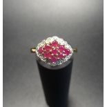 RUBY AND DIAMOND CLUSTER RING the multi rubies in illusion set diamond surround, on nine carat