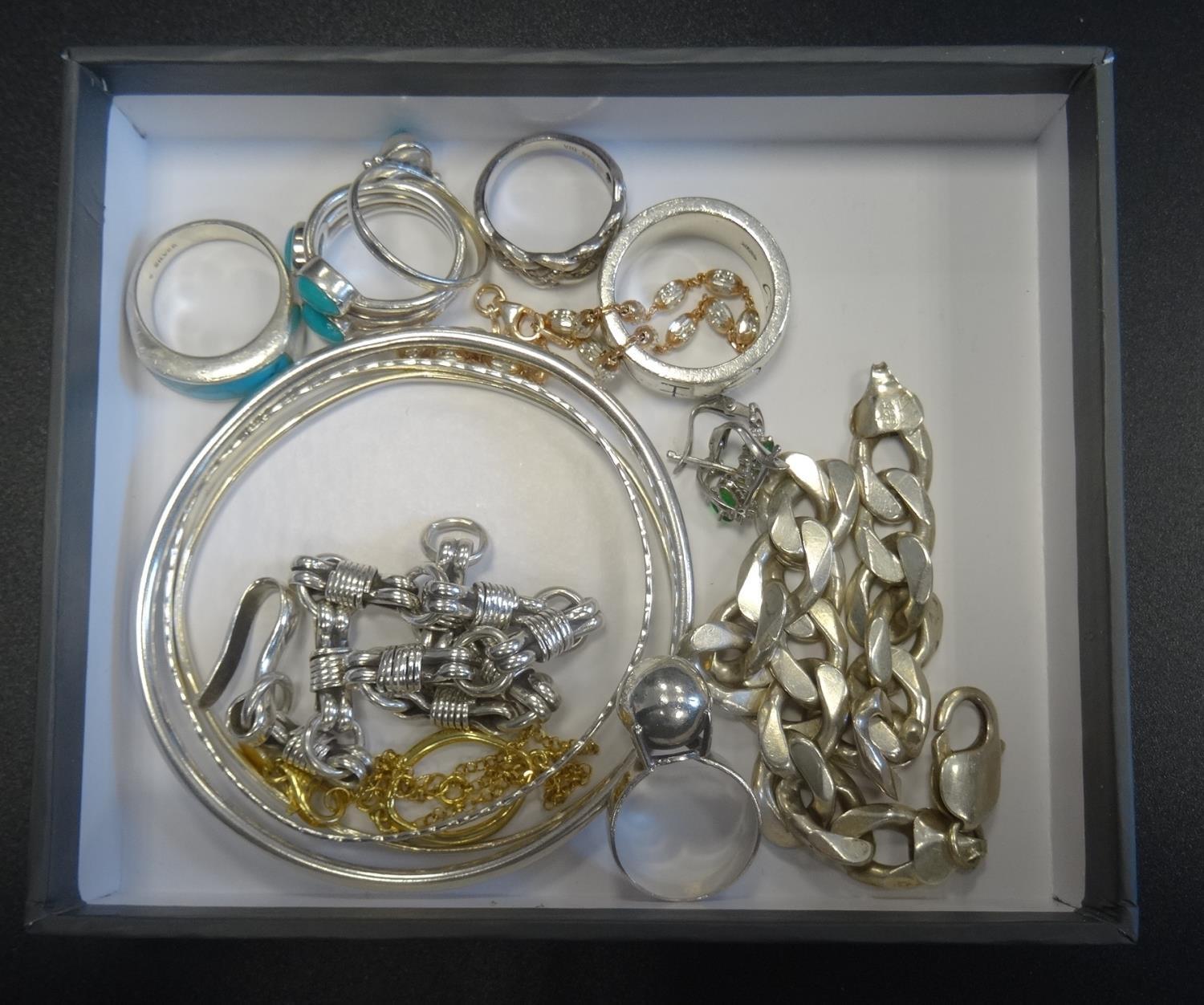 SELECTION OF SILVER JEWELLERY including three turquoise set rings, a diamond set ring, bangles,