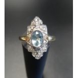 ART DECO STYLE AQUAMARINE AND DIAMOND PLAQUE RING the central oval cut aquamarine in multi diamond