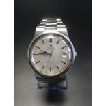GENTLEMAN'S VINTAGE OMEGA WRISTWATCH the circular silvered dial with baton hour markers, date