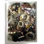 LARGE COLLECTION OF COSTUME JEWELLERY including earrings, brooches, enamel set bangles, a charm