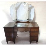 MAHOGANY KNEEHOLE DRESSING CHEST with tri-plate mirror above the lower compartment with single