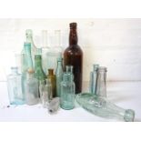 SELECTION OF VINTAGE GLASS BOTTLES including a William Hill of Glasgow with a 'Table Spoon' guide