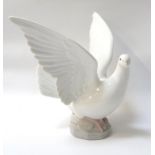 LLADRO FIGUREOF A DOVE with wings outstretched, impressed 6288 to the base, 20.5cm