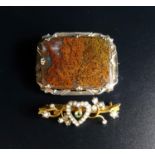 EDWARDIAN PERIDOT AND SEED PEARL BROOCH in nine carat gold; together with a moss agate set brooch in