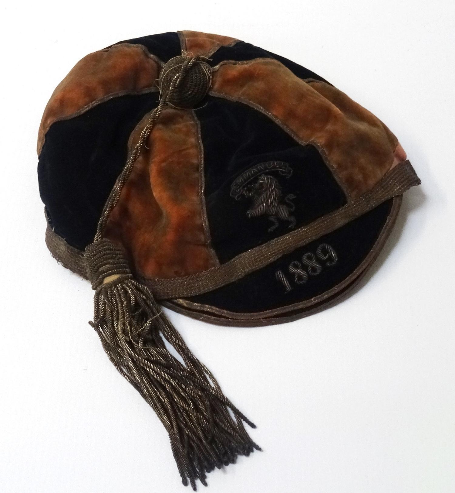VICTORIAN SPORTING CAP with bullion embroidered lion rampant beneath 'Emmanuel' and dated 1889,