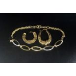 SMALL SELECTION OF GOLD comprising a single nine carat gold earring; a nine carat gold bracelet; and