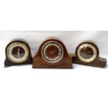 SMITHS OF ENFIELD MANTLE CLOCK in a shaped mahogany case, the dial with Arabic numerals and
