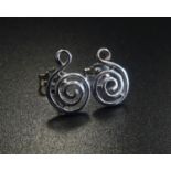 PAIR OF NINE CARAT WHITE GOLD STUD EARRINGS of spiral design