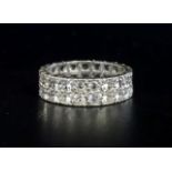 CLEAR GEM SET ETERNITY RING the double row of clear gemstones in nine carat white gold, ring size J