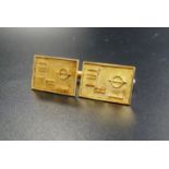 PAIR OF FOURTEEN CARAT GOLD CUFFLINKS the rectangular panel on each with geometric decoration, maker