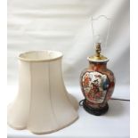 JAPANESE IMARI PATTERN TABLE LAMP on a pierced hardwood stand, the shaped body with decorative