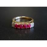 RUBY AND DIAMOND RING the four oval cut rubies flanked by four small diamonds to each shoulder, on