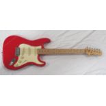 ROCKBURN ELECTRIC GUITAR with a red and white body with volume tone dials