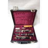 AMATI KRASLICE CLARINET from Czechoslovakia, marked 107646 with an ebony body and Yamaha mouthpiece,