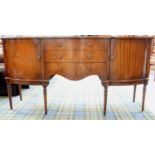 GEORGIAN STYLE MAHOGANY BOW FRONT SIDEBOARD with three central drawers flanked by a pair of cupboard