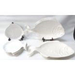 FIVE PORTUGUESE POTTERY FISH PLATES each modeled as a textured fish, 29cm long, together with two