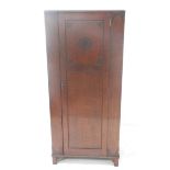 1950s AW-LYN OAK WARDROBE the single panelled door with carved motifs, opening to reveal a mirror