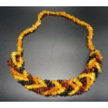 MODERN AMBER BEAD NECKLACE the varying shades of amber in plaited front section, total weight