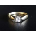 DIAMOND SOLITAIRE RING the round brilliant cut diamond approximately 0.1cts in illusion setting,