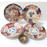 FOUR JAPANESE IMARI PATTERN PLATES with varying design and shaped rims, approximately 21cm wide; and