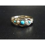 PRETTY TURQUOISE AND SEED PEARL RING on nine carat gold shank with pierced setting, ring size O