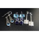 FOUR PAIRS OF SILVER EARRINGS comprising a pair of Ola Gorie drop earrings with motif decoration;