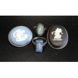 TWO WEDGWOOD BROOCHES AND TWO WEDGWOOD RINGS all in silver and with classical figure detail and (4)