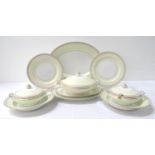 NORITAKE DINNER SERVICE decorated with a white and pale green ground with gilt highlights,