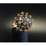 LARGE FLOWER HEAD DESIGN SAPPHIRE CLUSTER DRESS RING the central sapphire in double sapphire