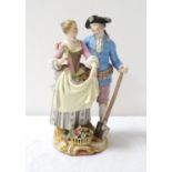 LATE 19TH CENTURY MEISSEN GROUP depicting a courting couple, the lady collecting flowers, the