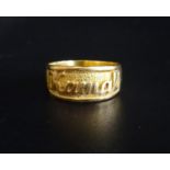 TWENTY-TWO CARAT GOLD RING with name panel for 'Kamal', approximately 7.9 grams
