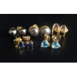 FIVE PAIRS OF PEARL AND GEM SET EARRINGS comprising two pairs of black pearl stud earrings, a pair