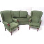 HSL THREE PIECE SUITE comprising two wing back arm chairs on cabriole front supports and a two