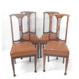 SET OF FOUR MAHOGANY AND INLAID DINING CHAIRS with a shaped top rail above a central pierced splat