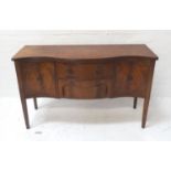REGENCY STYLE MAHOGANY SERPENTINE SIDEBOARD the reeded moulded top above a central frieze drawer and