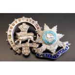 TWO SILVER MILITARY BROOCHES one with enamel decoration marked 'Worcestershire'; the other with