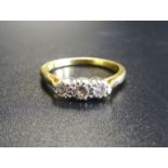DIAMOND THREE STONE RING on eighteen carat gold shank, ring size J and total weight approximately
