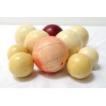 TEN CHINESE IVORY BALLS of varying size and some stained (10)