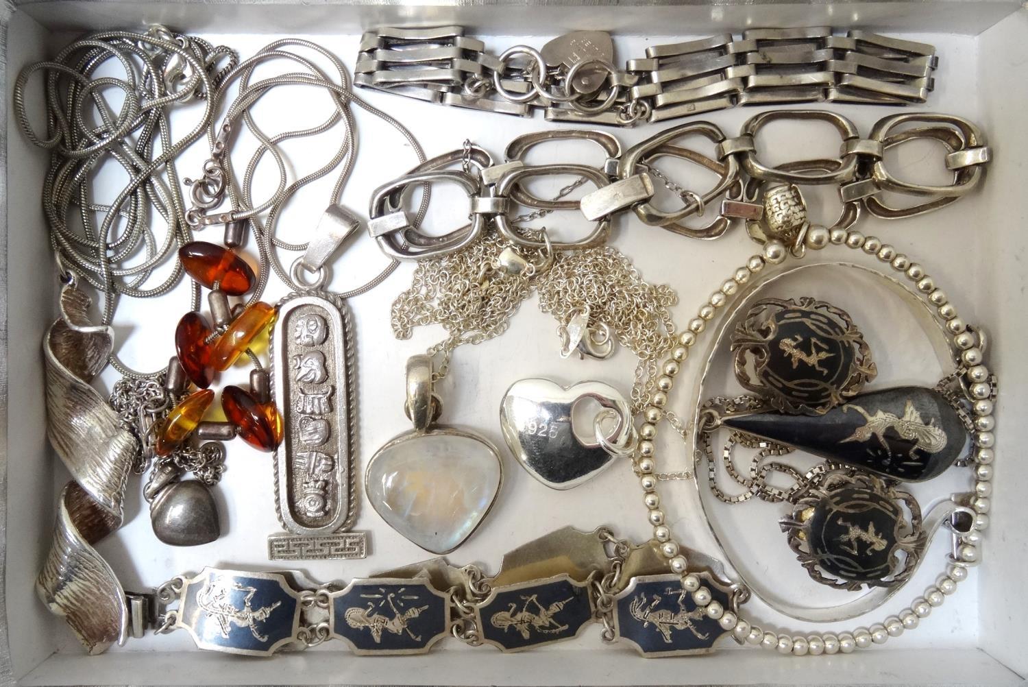 GOOD SELECTION OF SILVER JEWELLERY including an amber set necklace, an Egyptian style hieroglyph