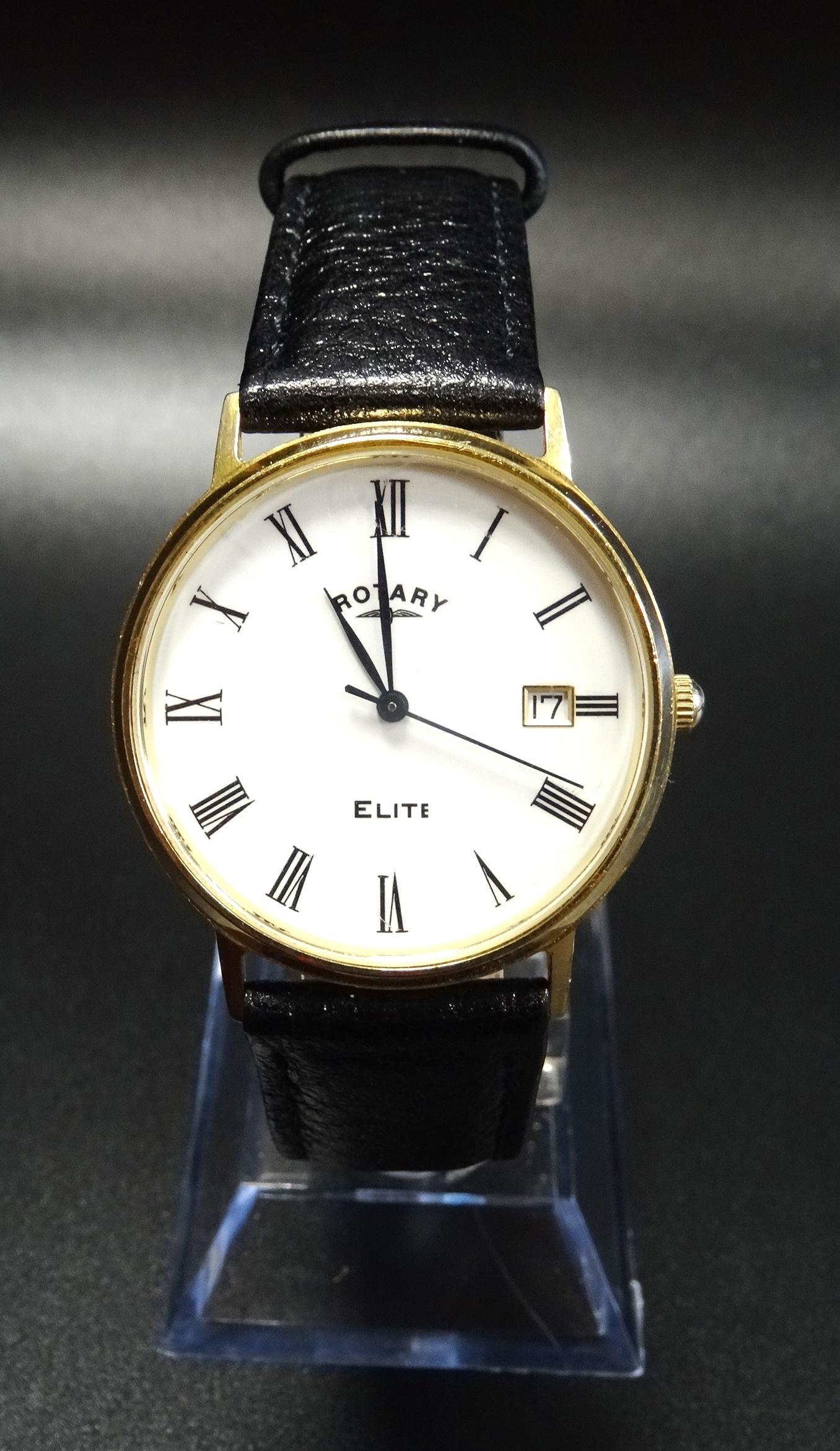 GENTLEMAN'S NINE CARAT GOLD CASED WRISTWATCH the white dial with Arabic numerals and date