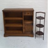 CARVED OAK SIDE CABINET with a moulded top above three open shelves and a frieze drawer with an open