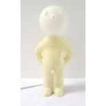 NOVELTY LAMP by Propaganda, depicting a white plastic naked man with his arms behind his back, and